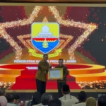 Gubernur Al Haris Raih Penghargaan Akreditasi Kearsipan