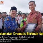 Aksi Penyelamatan Dramatis Berbuah Apresiasi, Dedy “Mamek” Terima Penghargaan dari Polres Labusel yang Diserahkan Langsung Wakil Bupati Labusel Syahdian Purba Siboro, S.H.